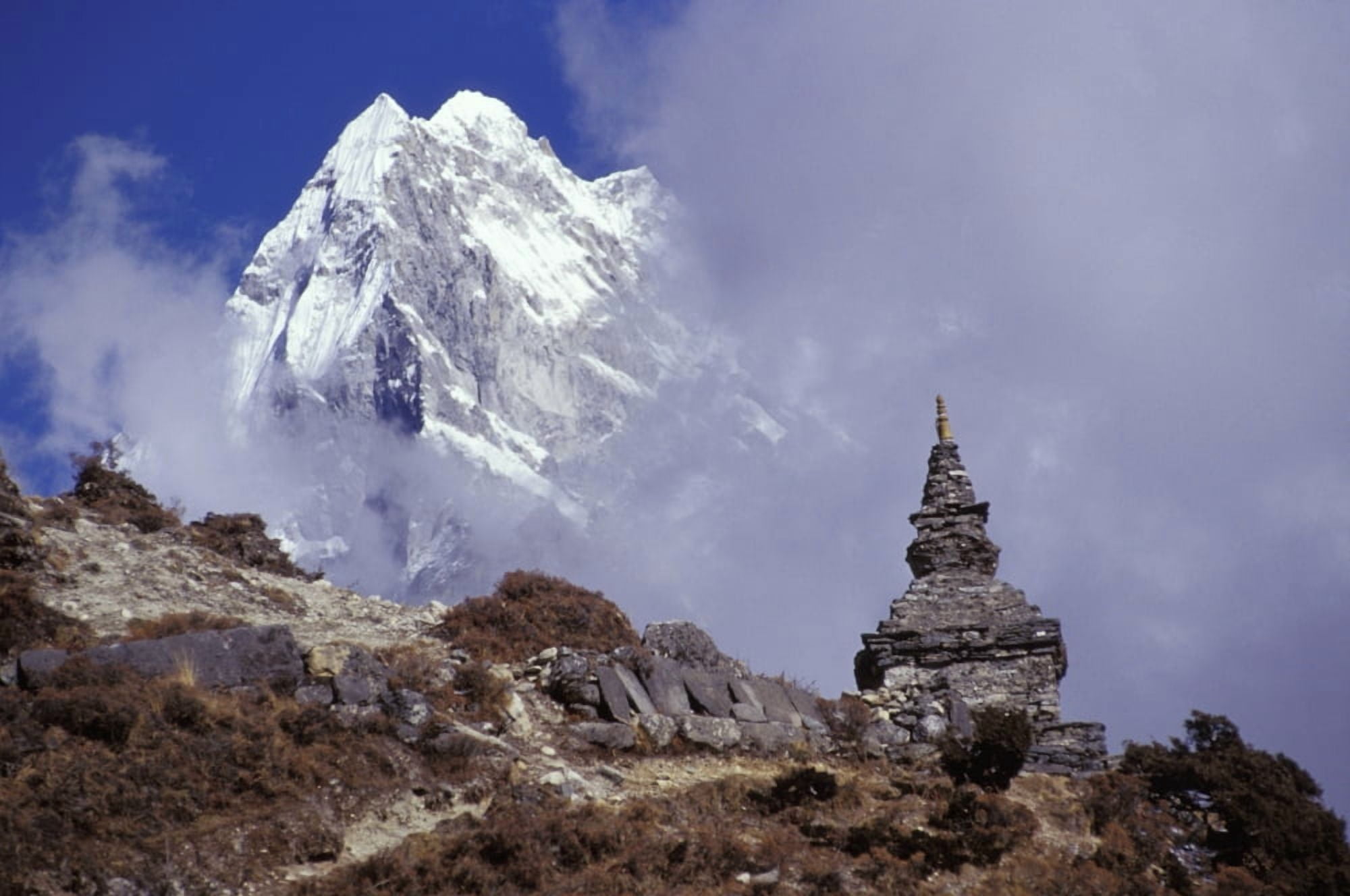 Snow Covered Peak With Cultural Monument In Forefront Canvas Art - Sean White Design Pics (17 x 11)