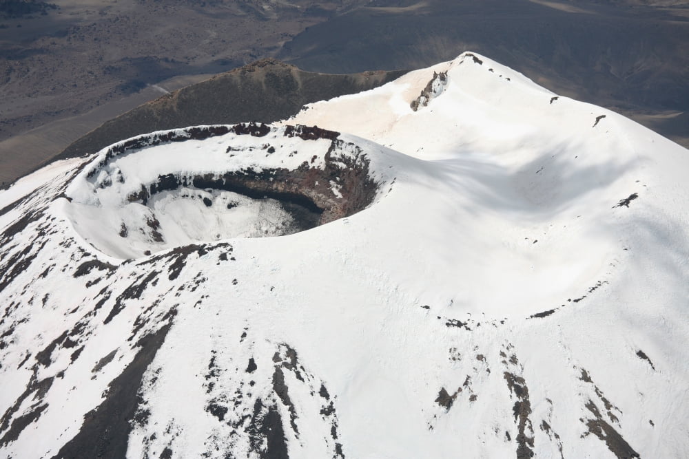 Snow-covered Ngauruhoe cone Mount Tongariro volcano New Zealand Canvas Art - Richard RoscoeStocktrek Images (35 x 23)