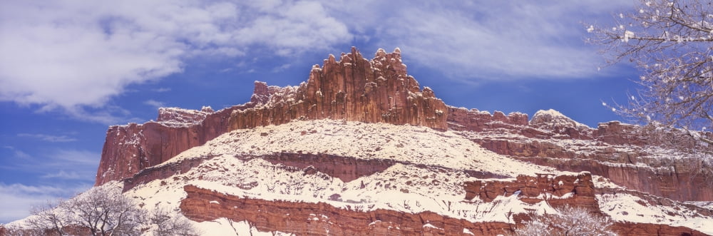 Snow covered cliff in Capitol Reef National Park against blue sky Utah USA Canvas Art - Panoramic Images (27 x 9)