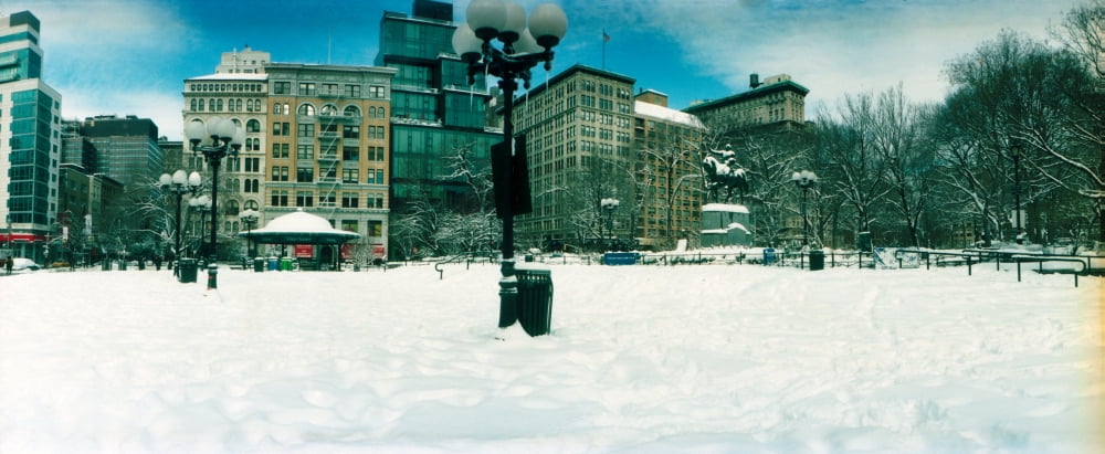 Snow covered park Union Square Manhattan New York City New York State USA Canvas Art - Panoramic Images (27 x 9)