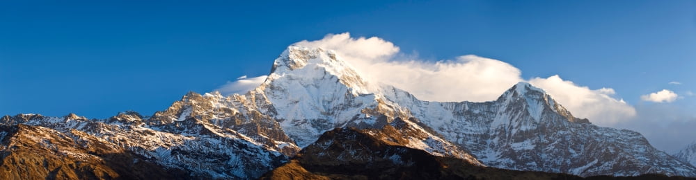 Snowcapped mountains Hiunchuli Annapurna Range Himalayas Nepal Canvas Art - Panoramic Images (27 x 9)