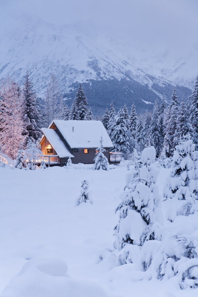 Snowcovered Home In A Wintry Meadow At Dawn With Inside Lights On Girdwood Southcentral Alaska Canvas Art - Jeff Schultz Design Pics (22 x 34)