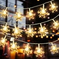 thumbnail image 1 of Snowflake String Lights, 19.6 FT 40LED Battery Operated Waterproof Fairy Lights for Indoor Outdoor  Snowflake String Lights, Garden Patio Yard Tree Decor (Warm White), 1 of 8