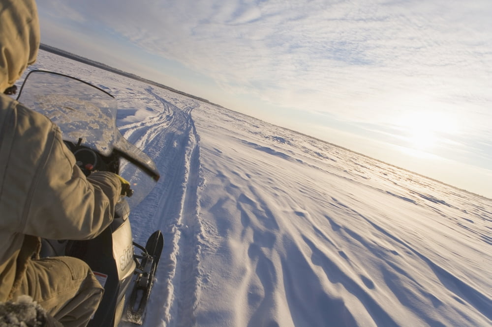 Snowmachiner Following Trail On Frozen Snow Covered Kuskokwim River Western Alaska Winter Canvas Art - Kevin Smith Design Pics (38 x 24)