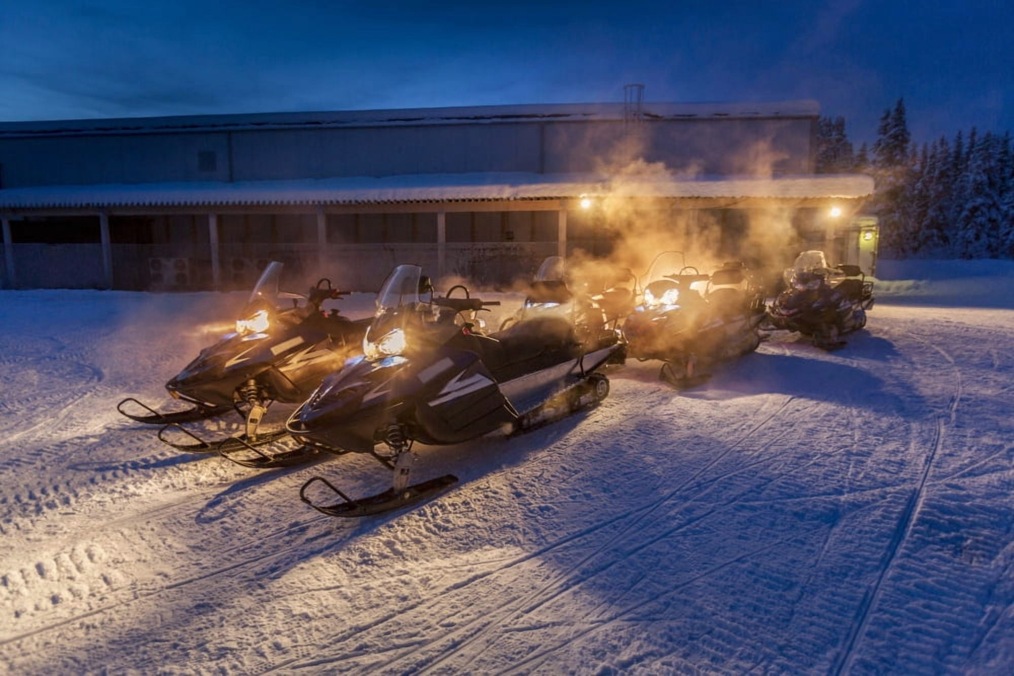 Snowmobiles in the freezing cold temperatures as low as -47 celsius Lapland Sweden Canvas Art - Panoramic Images (36 x 12)