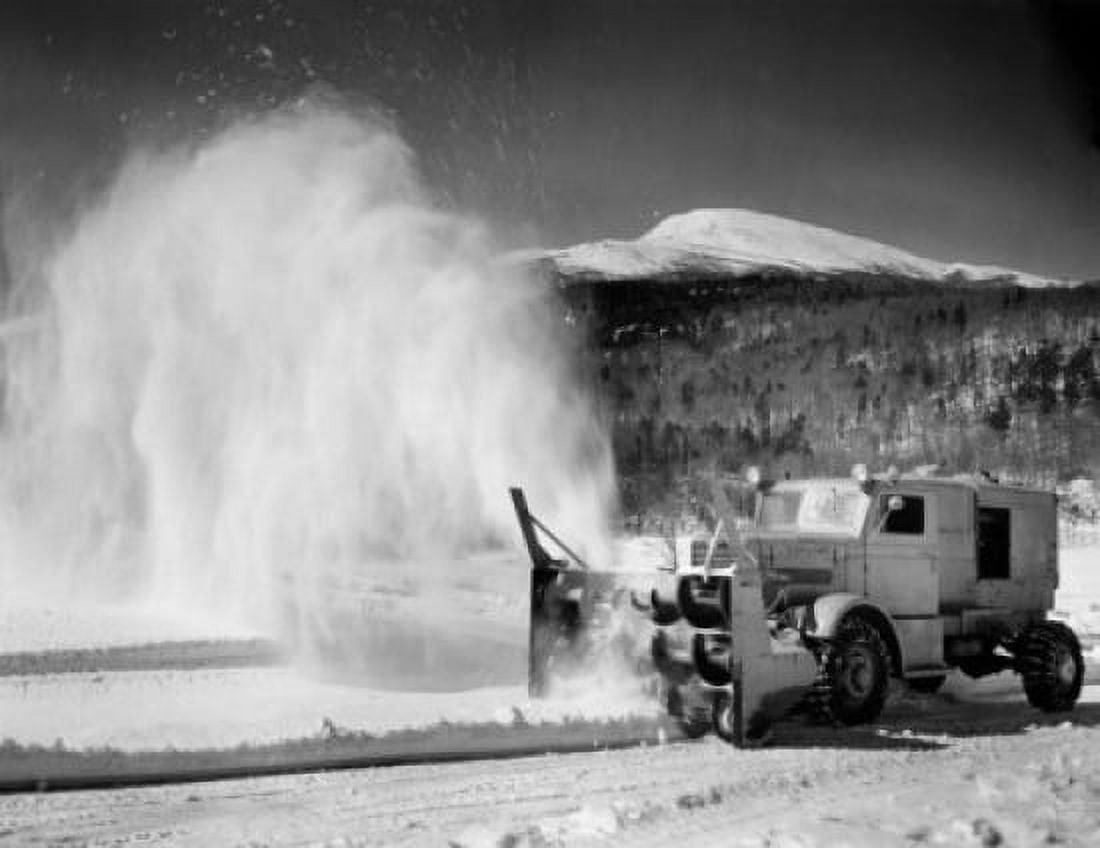 Snowplow on a road New Hampshire USA Canvas Art - (18 x 24)