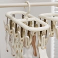 thumbnail image 1 of Socks Drying Rack, Multifunctional Foldable Laundry Helper with Clips for Underwear, Gloves, Towels, Space Saving Design for Dorm and Home Use, 1 of 6