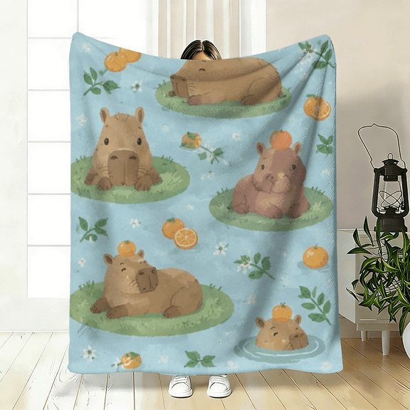 Soft plush fleece blanket, cute light blue with capybara and orange print, ideal for sofa, bed, or travel, great gift for animal lovers, fresh all-season decor.