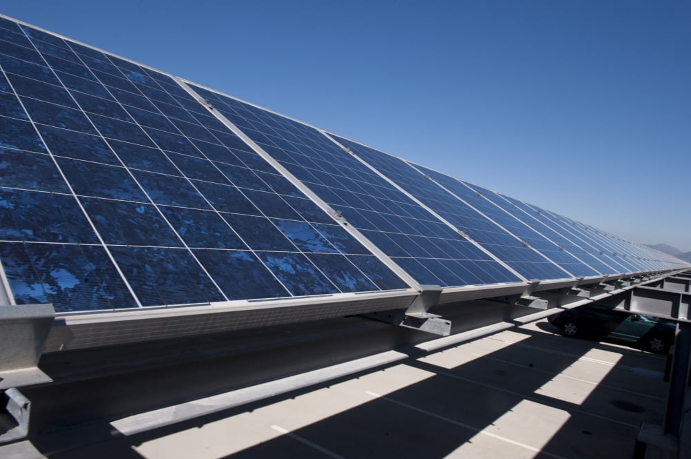 Solar panels installed on top of a parking garage Canvas Art - Stocktrek Images (34 x 23)