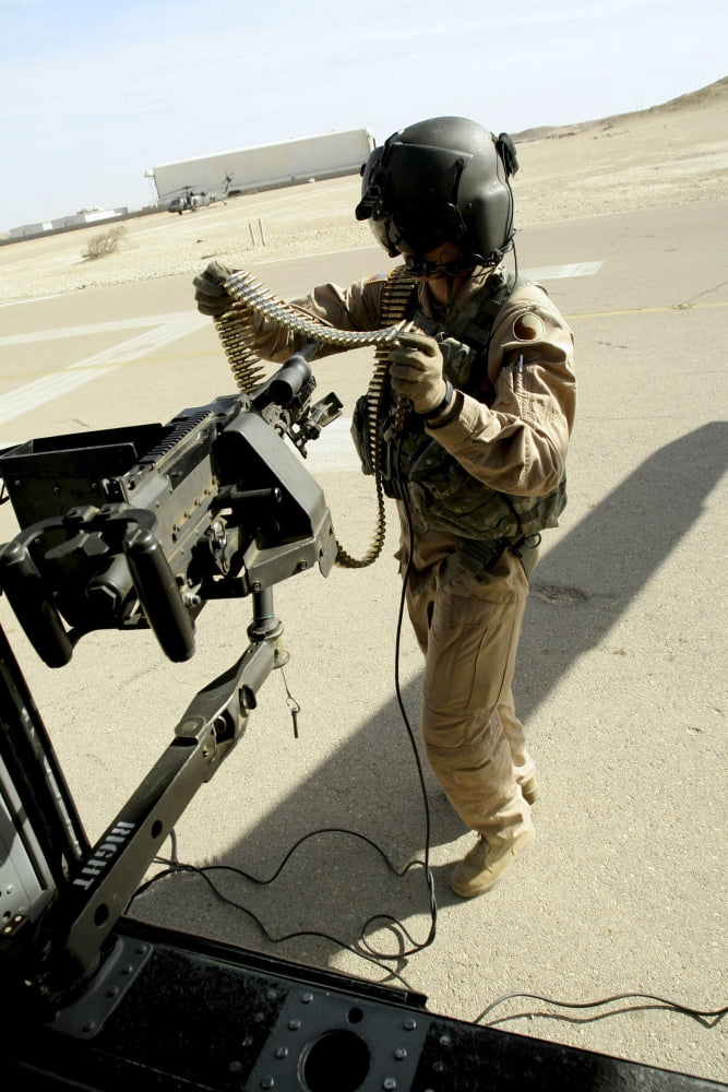 Soldier carries 762 mm rounds to a M240G medium machine gun Canvas Art - Stocktrek Images (23 x 34)
