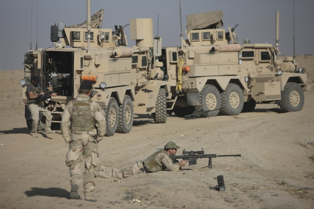 Soldier fires a Barrett M82A1 rifle in Kunduz Afghanistan Canvas Art - Terry MooreStocktrek Images (35 x 24)
