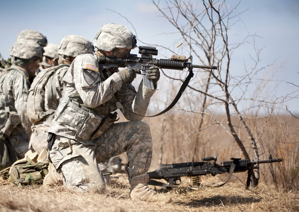 Soldier fires his rifle at a target Canvas Art - Stocktrek Images (34 x 24)