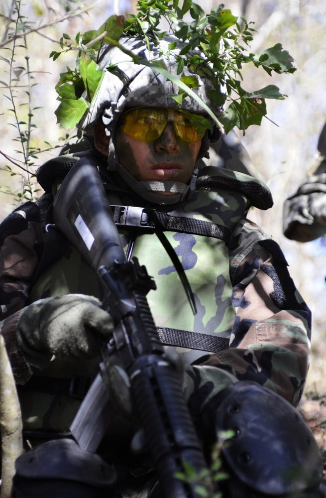 Soldier in camouflage during a field training exercise Canvas Art - Stocktrek Images (23 x 34)