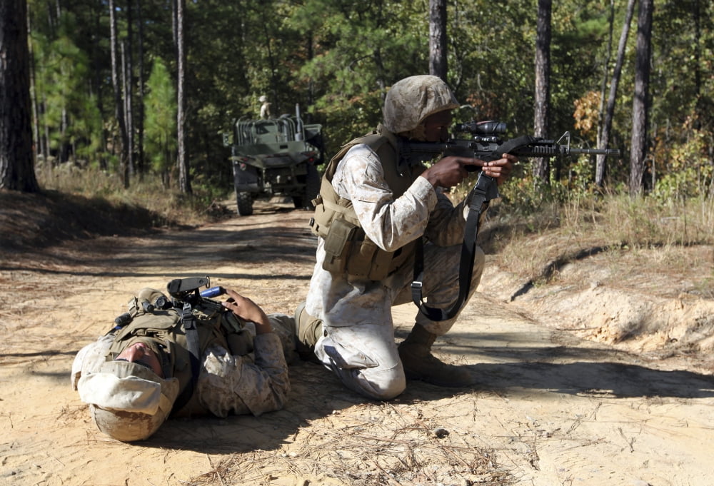 Soldier provides security to a casualty during a simulated drill Canvas Art - Stocktrek Images (34 x 24)