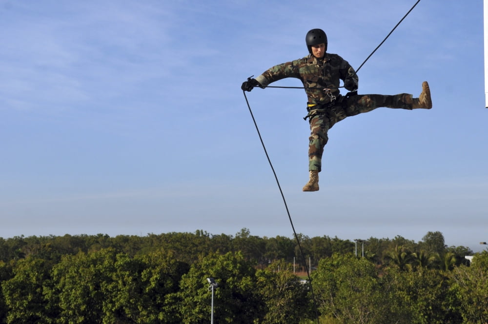 Soldier rappels off a tower while training during Exercise Talisman Sabre 2011 Canvas Art - Stocktrek Images (35 x 23)