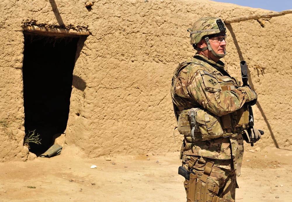 Soldier stands guard during a routine mission in Kajaki Afghanistan Canvas Art - Stocktrek Images (34 x 24)