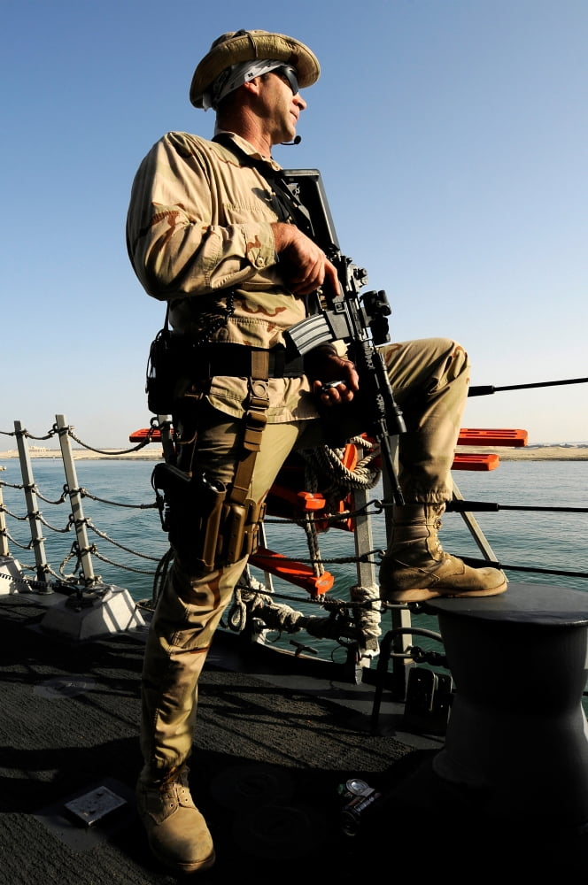 Soldier stands watch aboard USS Momsen Canvas Art - Stocktrek Images (23 x 35)