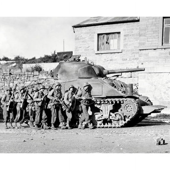 Soldiers and their tank advance into a Belgian town during WWII Poster Print by Stocktrek Images