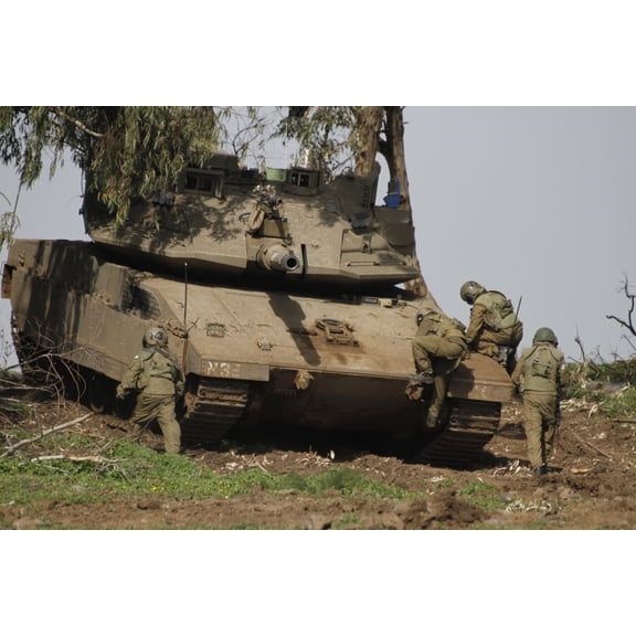 Soldiers climb into an Israel Defense Force Merkava Mark IV battle tank Canvas Art - Ofer ZidonStocktrek Images (35 x 23)
