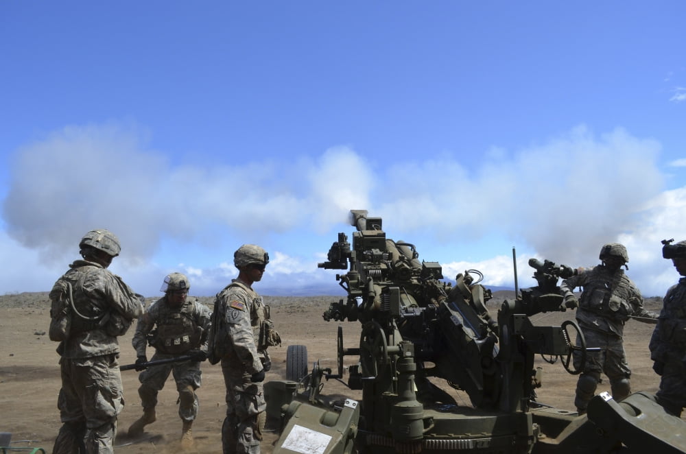 Soldiers firing the M777 howitzer cannon Canvas Art - Stocktrek Images (35 x 23)