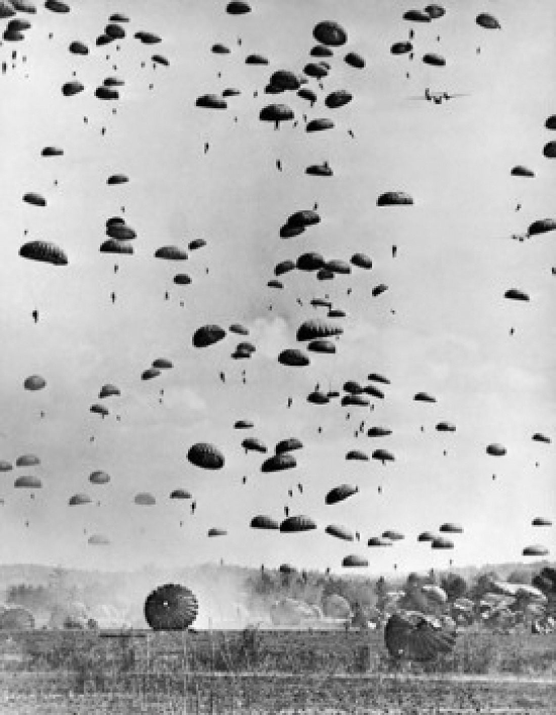 Soldiers flying with parachutes in the sky Canvas Art - (18 x 24)