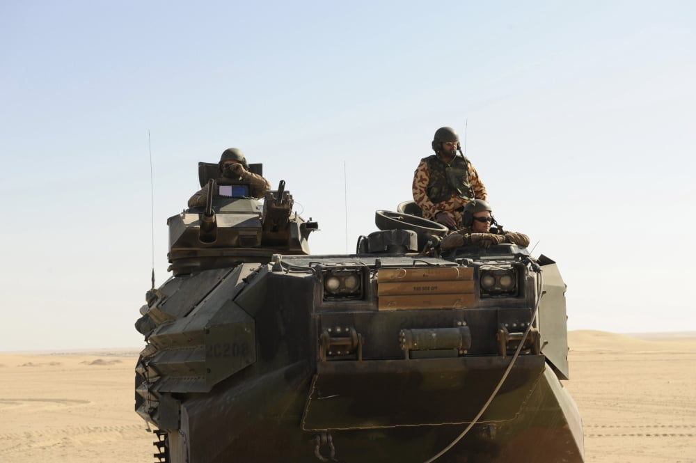 Soldiers operating an amphibious assault vehicle Canvas Art - Stocktrek Images (34 x 23)