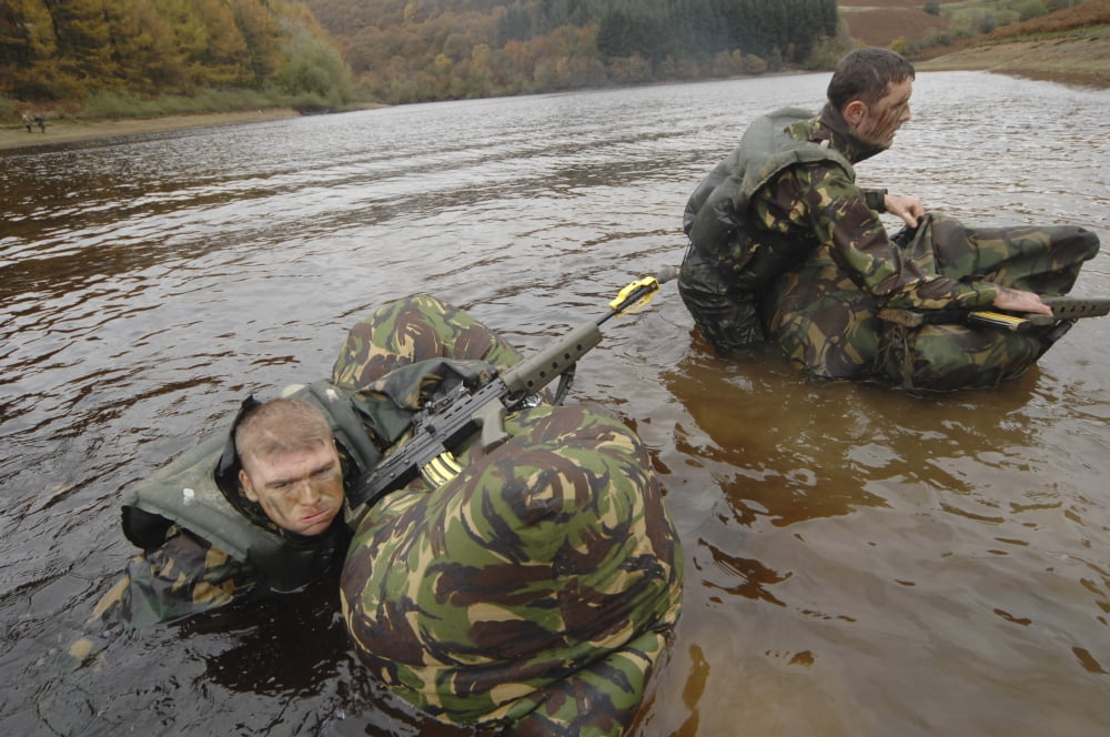 Soldiers participate in a river crossing during Exercise Cambrian Patrol Canvas Art - Andrew ChittockStocktrek Images (17 x 12)