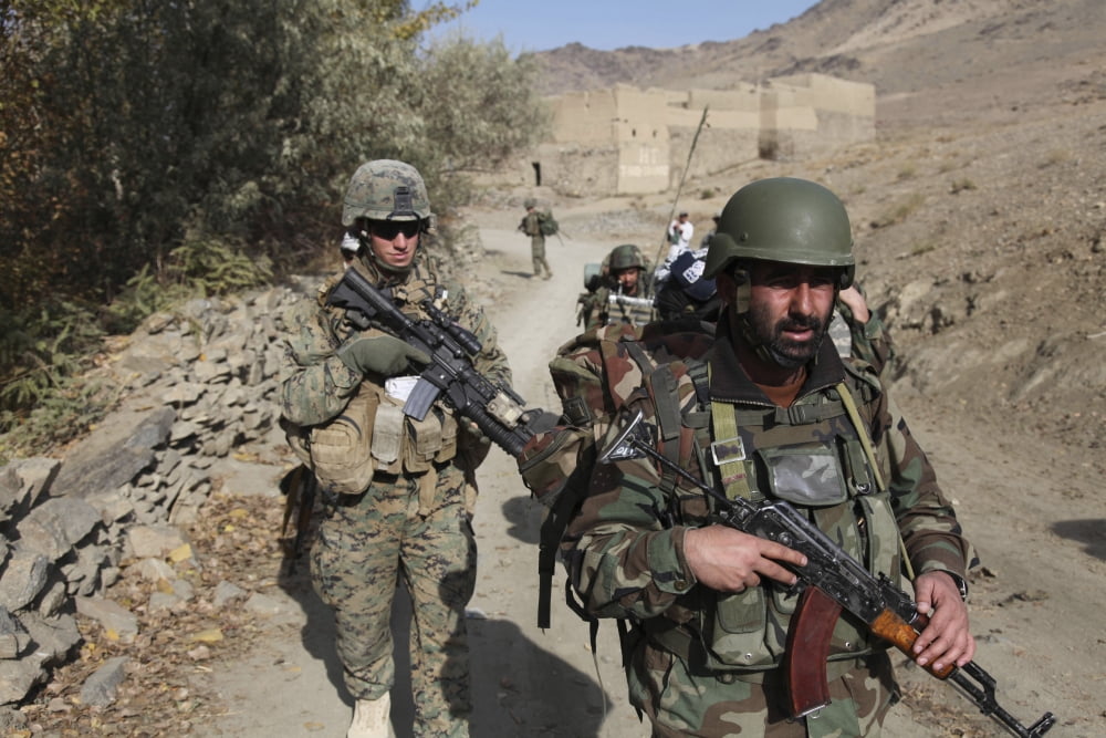 Soldiers patrol the Depak Valley in Afghanistan Canvas Art - Stocktrek Images (34 x 23)