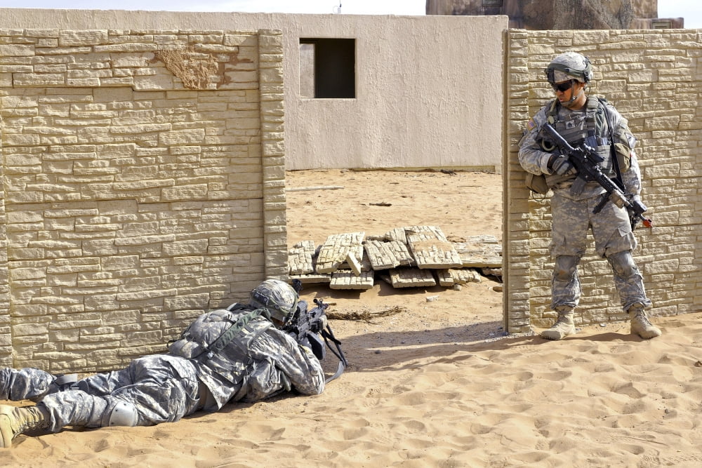 Soldiers pull security at a mock Afghan village in Fort Bliss Texas Canvas Art - Stocktrek Images (35 x 23)