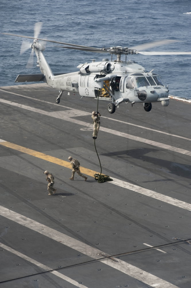 Soldiers rappel from an MH-60S Sea Hawk helicopter Canvas Art - Stocktrek Images (23 x 35)