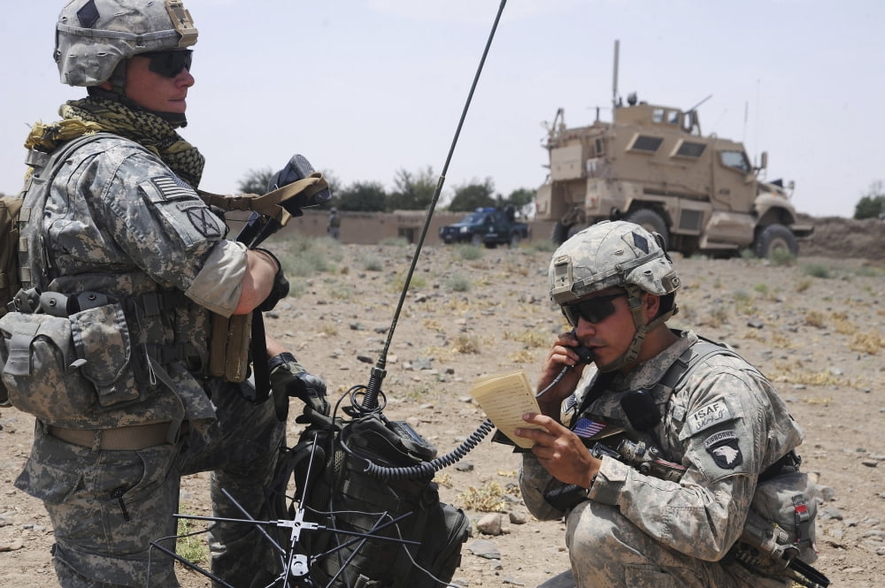 Soldiers setting up a satellite communications radio Canvas Art - Stocktrek Images (35 x 23)