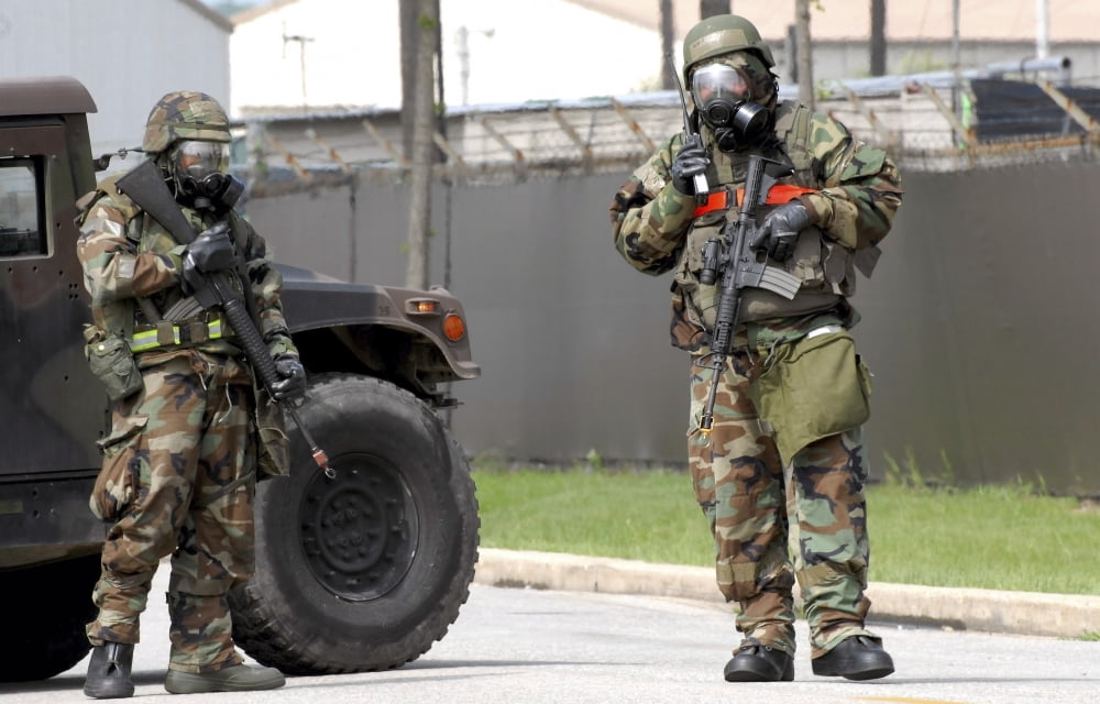 Soldiers stand guard at an intersection during a bomb threat Canvas Art - Stocktrek Images (35 x 22)