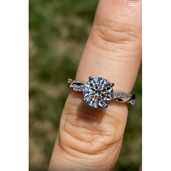 Solitaire Brilliance 1.5CT Round Brilliant Moissanite Twisted Engagement Ring 10K White Gold, Ring Size 10.5