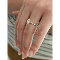 Solitaire Brilliance 1 Carat Oval Moissanite Engagement Ring with Space Pave in 10k Yellow Gold, Ring Size 4