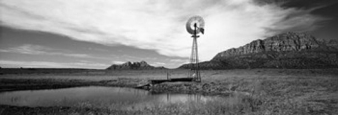 Solitary windmill near a pond US Route 89 Utah USA Canvas Art - Panoramic Images (36 x 13)