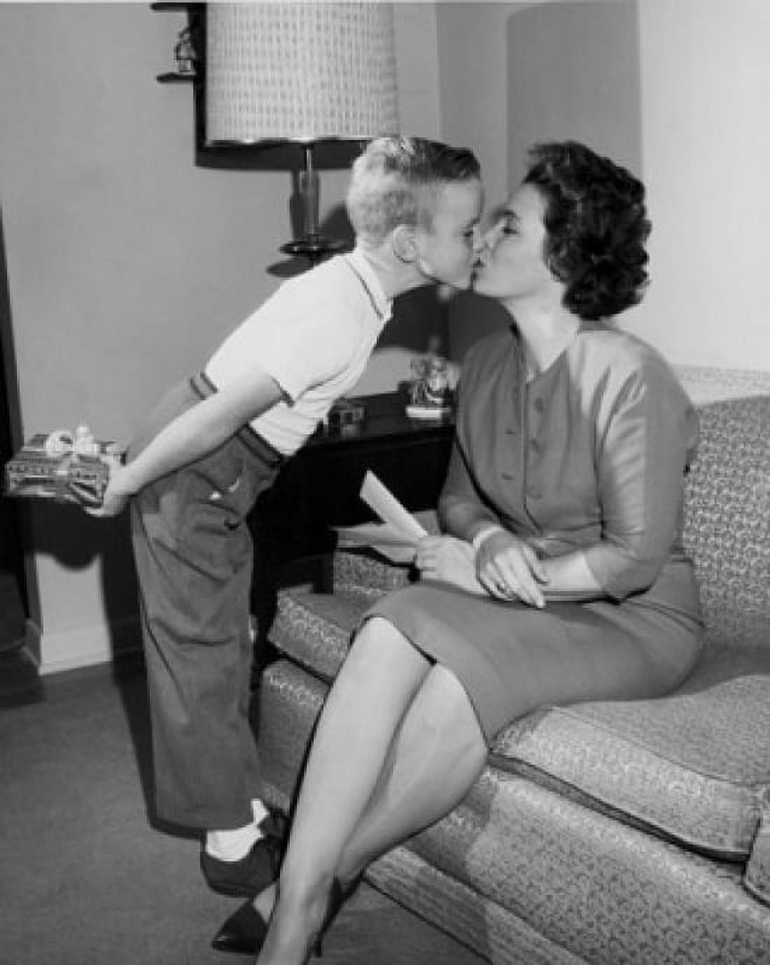 Son kissing his mother Canvas Art - (24 x 36)