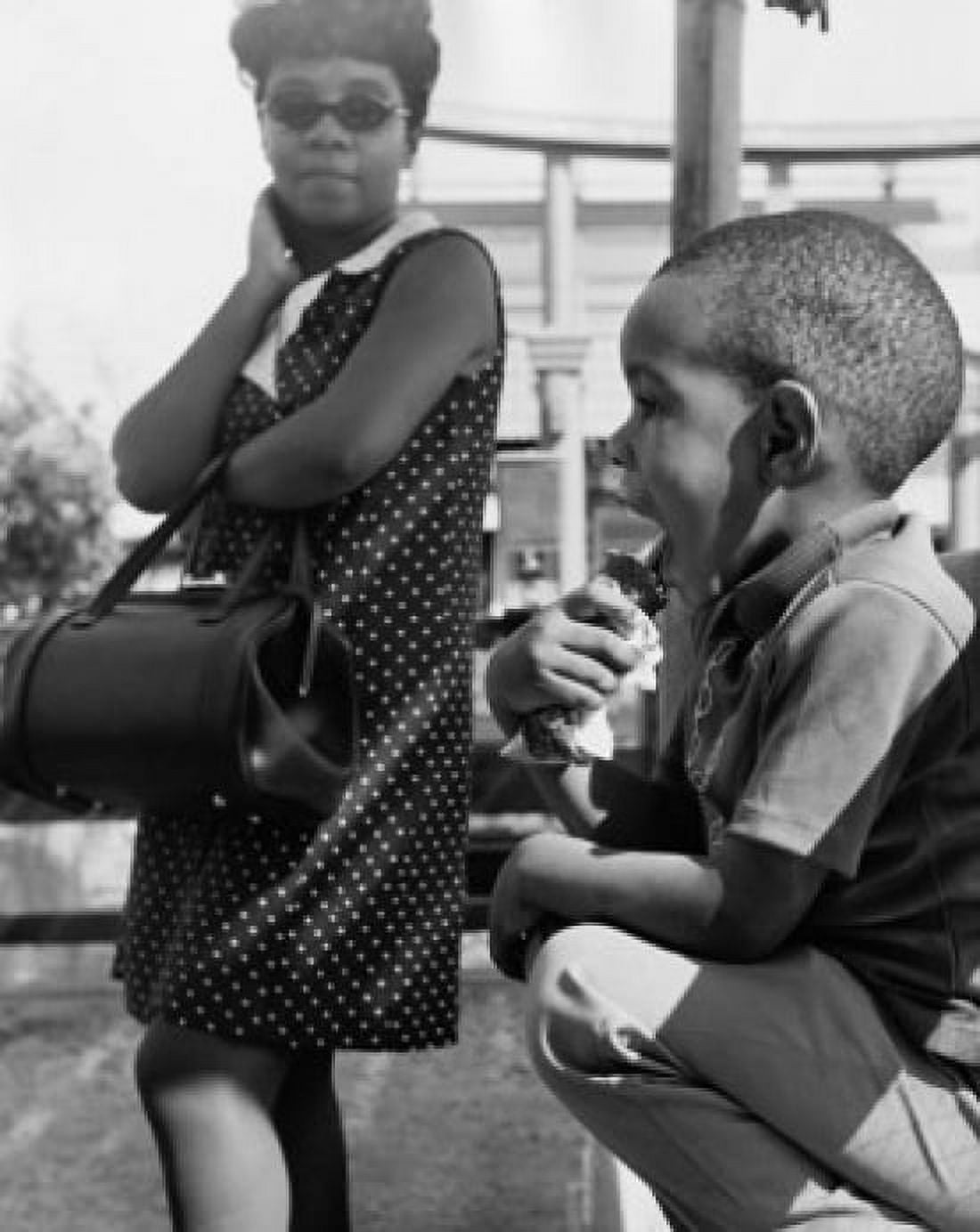 Son licking ice-cream with his mother looking at him Canvas Art - (24 x 36)