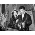 thumbnail image 1 of Song To Remember Woman Holding on a Man's Arms in a Movie Scene Photo Print (8 x 10), 1 of 1
