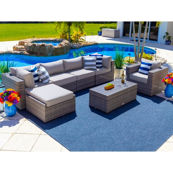 Sorrento 7-Piece Resin Wicker Outdoor Patio Furniture Sectional Sofa Set in Gray w/ Four Sectional Pieces, Ottoman, Armchair, and Coffee Table (Flat-Weave Gray Wicker, Polyester Light Gray)