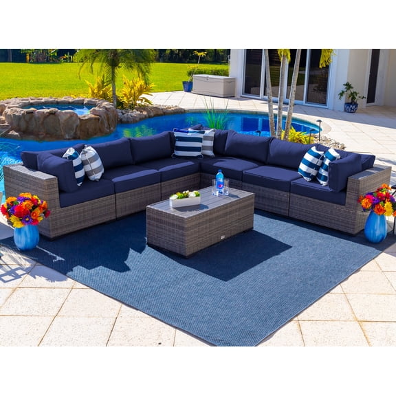 Sorrento 8-Piece Resin Wicker Outdoor Patio Sectional Sofa Set in Gray w/ Seven Sectional Seats and Coffee Table (Flat-Weave Gray Wicker, Sunbrella Canvas Navy)