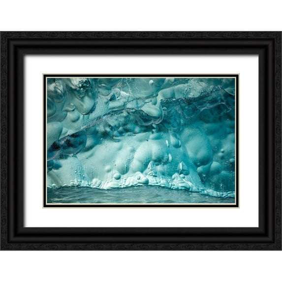 Souders, Paul 32x23 Black Ornate Wood Framed with Double Matting Museum Art Print Titled - Alaska-Tracy Arm-Close-up of deep blue-green iceberg floating near face of South Sawyer Glacier