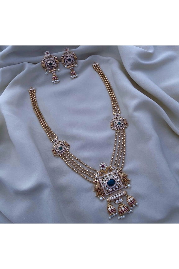 South Indian Bollywood Gold-Plated Long Necklace Set White Green & Ruby AD CZ Kemp Stones with Matte Finish & Matching Jhumka Earrings Jhumka Style Jewelry