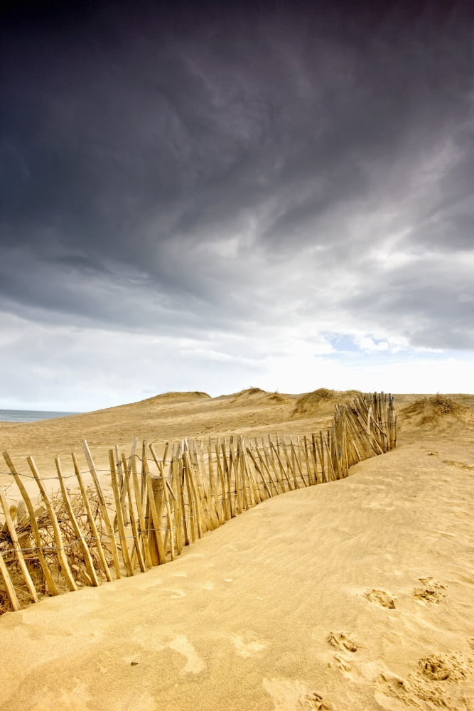 South Shields Tyne And Wear England Dark Skies Over Beach With Fence Canvas Art - John Short Design Pics (24 x 38)
