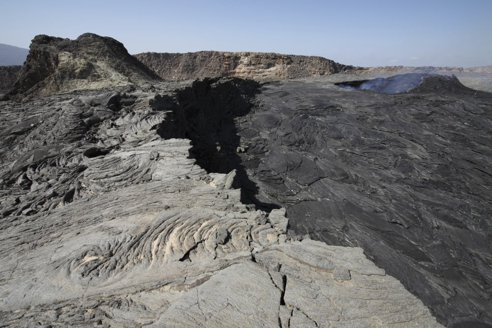 South pit crater filled by basaltic lava flows Erta Ale volcano Danakil Depression Ethiopia Canvas Art - Richard RoscoeStocktrek Images (18 x 12)