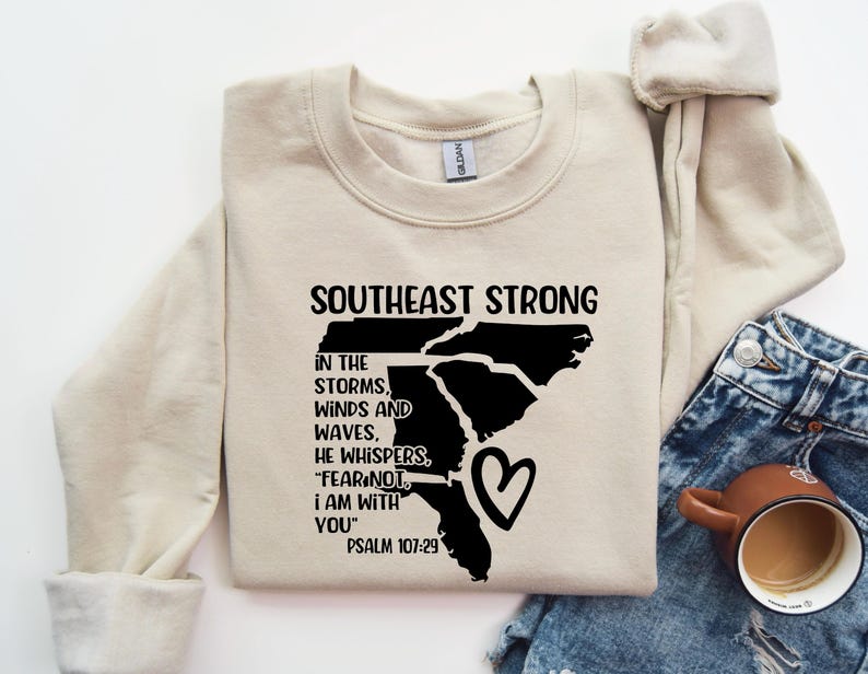 Southeast Strong Sweatshirt, In The Storms Winds And Waves He Whispers