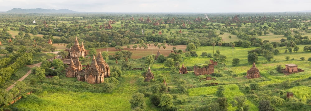 Southern view of stupas seen from top of tower at Aureum Palace Hotel Bagan Mandalay Region Myanmar Canvas Art - Panoramic Images (36 x 12)