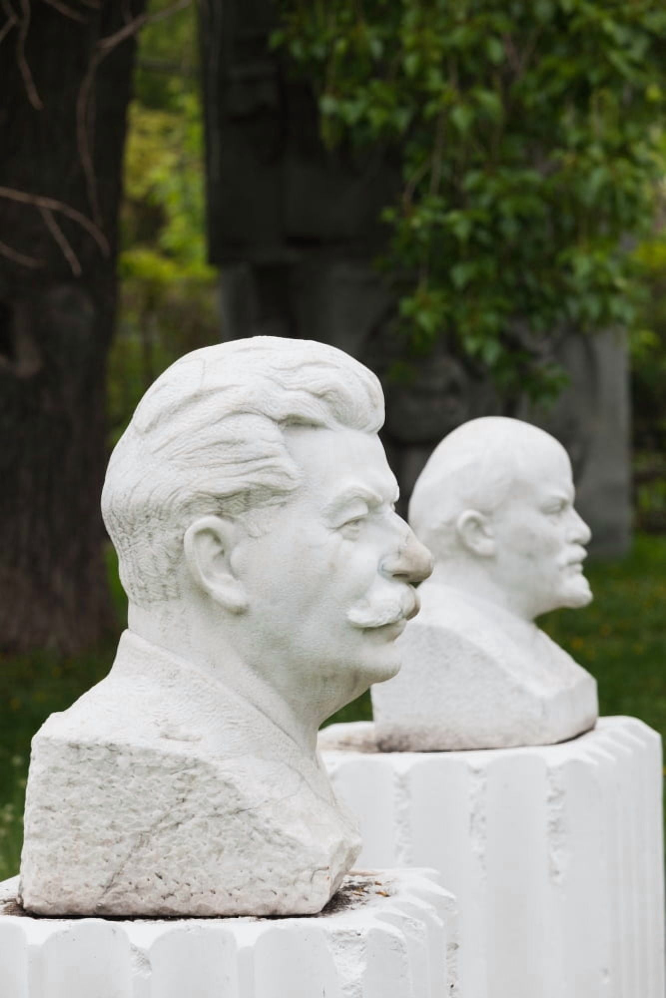 Soviet-era sculptures of Vladimir Lenin and Joseph Stalin at Art Muzeon Sculpture Park Zamoskvorechiye-Area Moscow Russia Canvas Art - Panoramic Images (27 x 9)