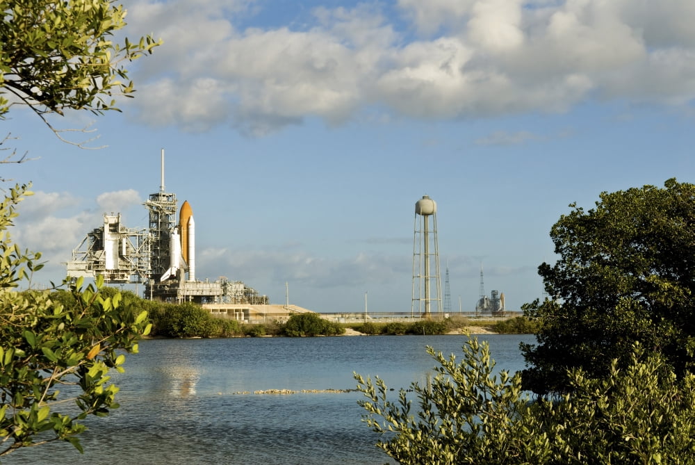 Space Shuttle Atlantis and Endeavour sit on their launch pads at Kennedy Space Center Canvas Art - Stocktrek Images (34 x 23)