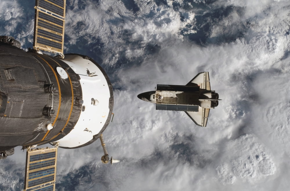 Space Shuttle Atlantis and the docked Soyuz spacecraft Canvas Art - Stocktrek Images (34 x 23)