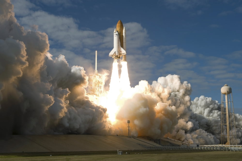 Space Shuttle Atlantis lifts off from its launch pad at Kennedy Space Center Florida Canvas Art - Stocktrek Images (34 x 23)